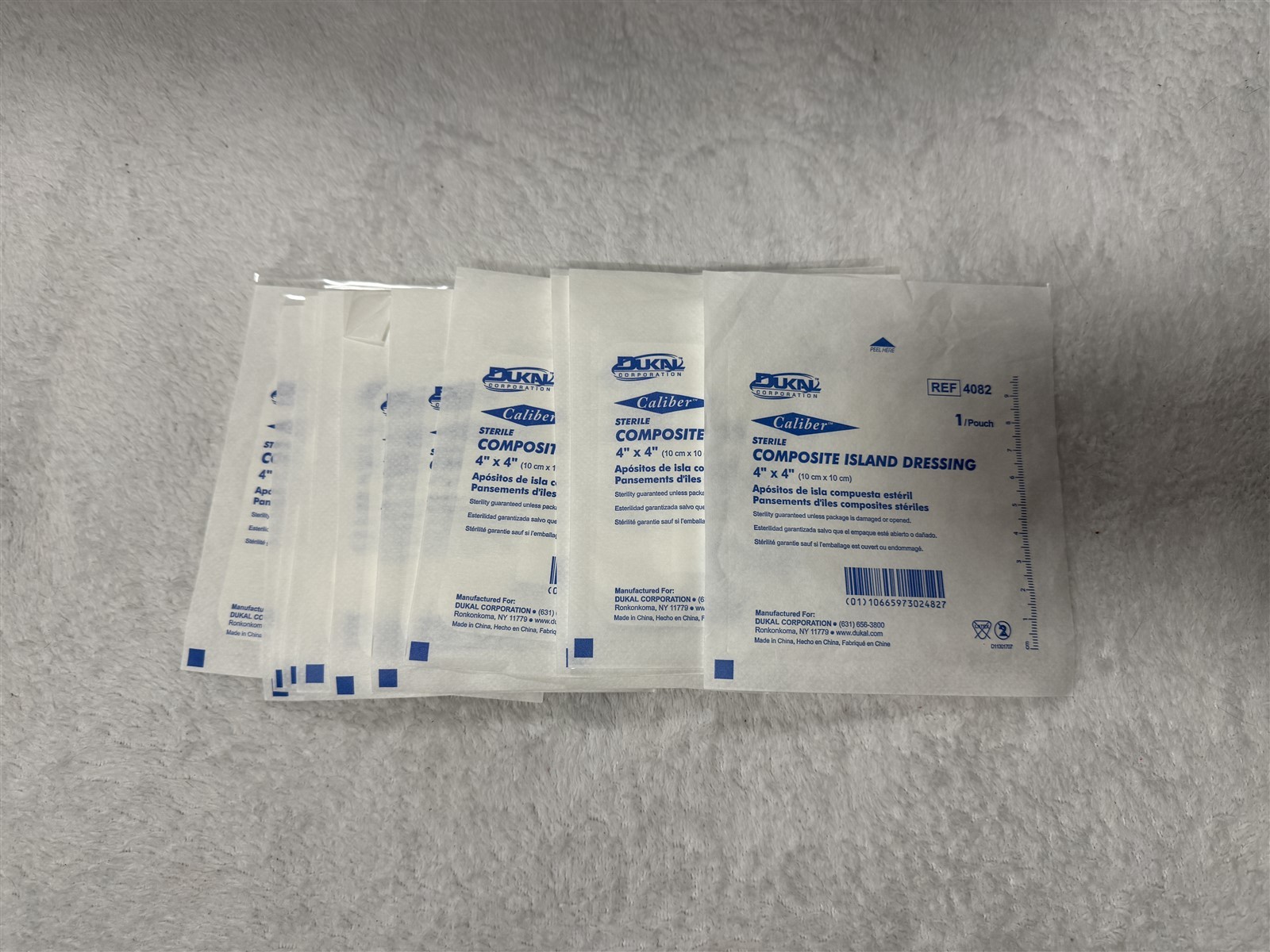 LOT OF 12 CALIBER STERILE COMPOSITE ISLAND DRESSING 4″x4″ REF 4082 DUKAL