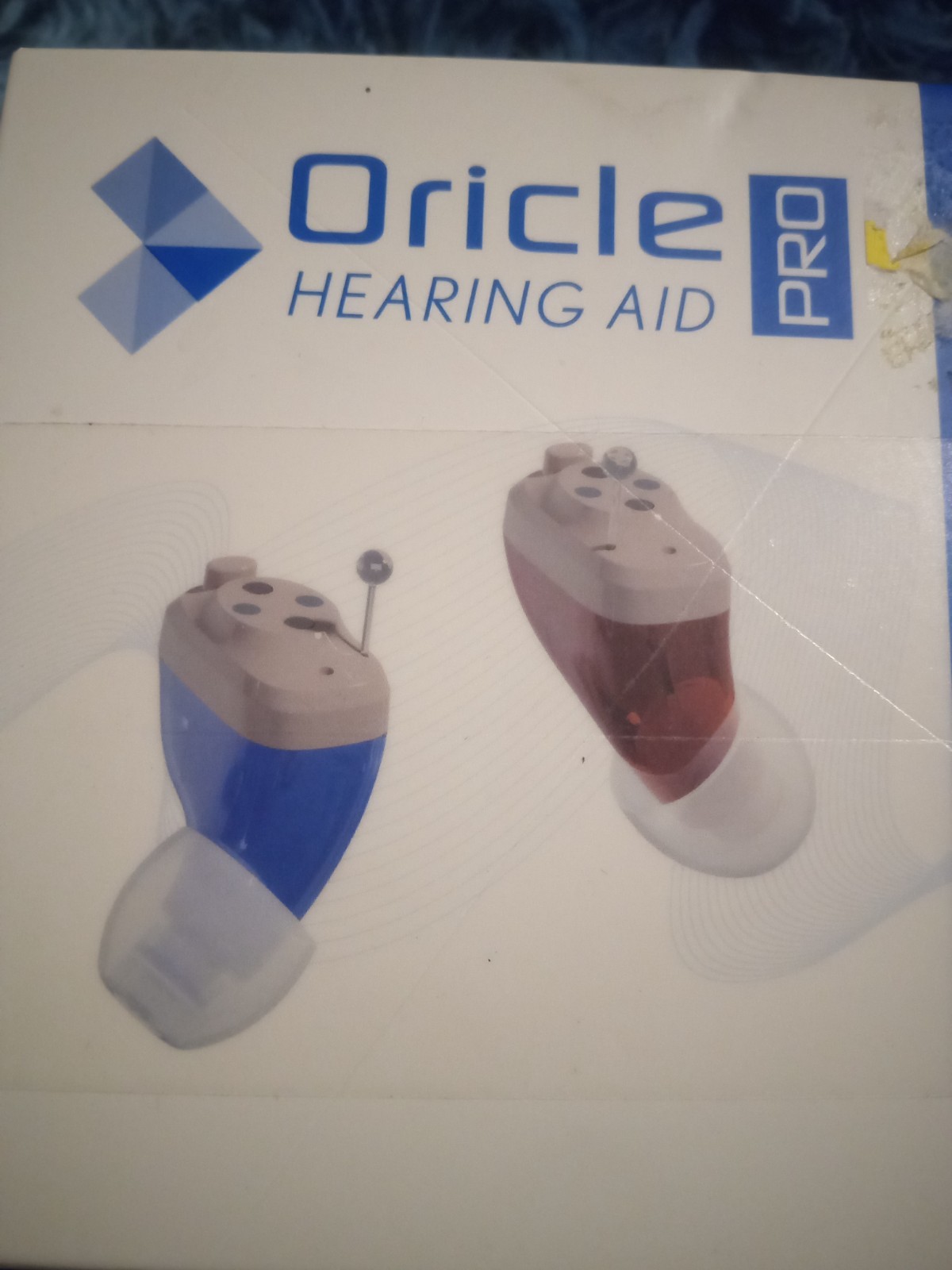 Oricle Pro hearing aids, rechargeable battery with charging case for both ears.