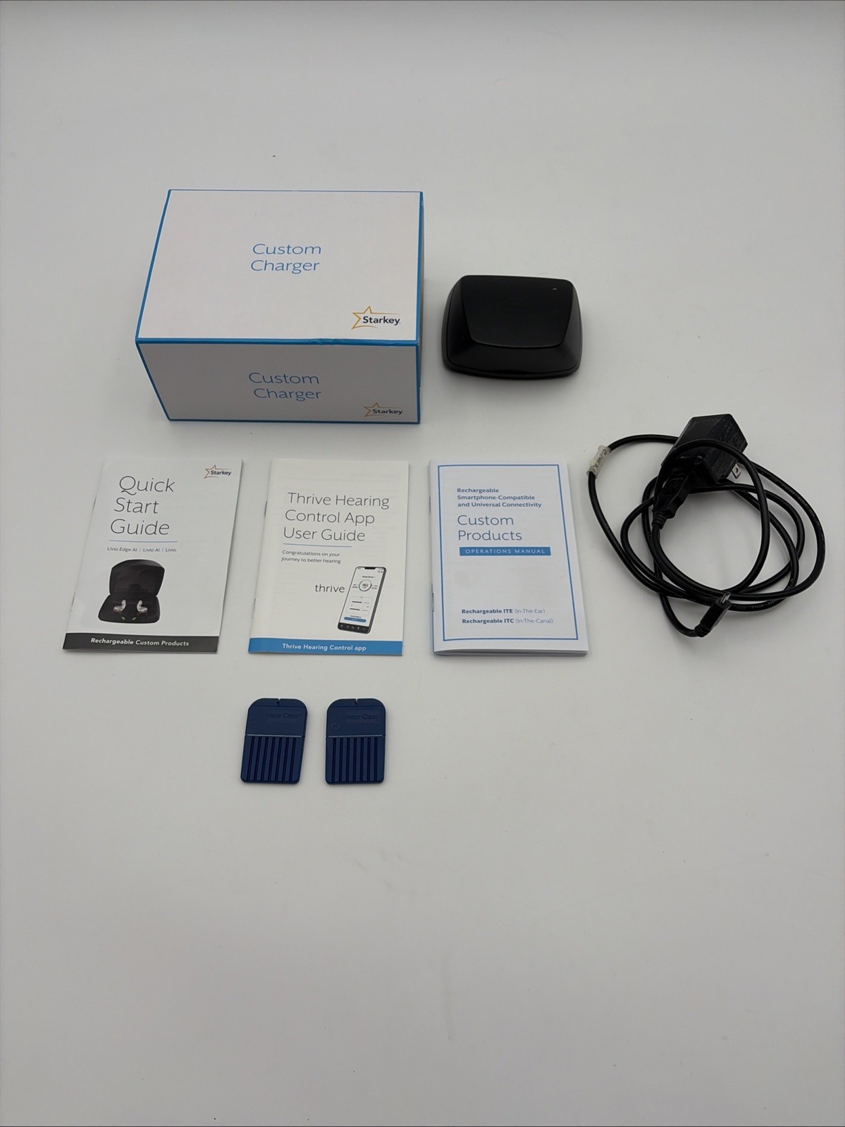 Used Starkey LIVIO AI 1200 RIC R Hearing Aids & Charging Case
