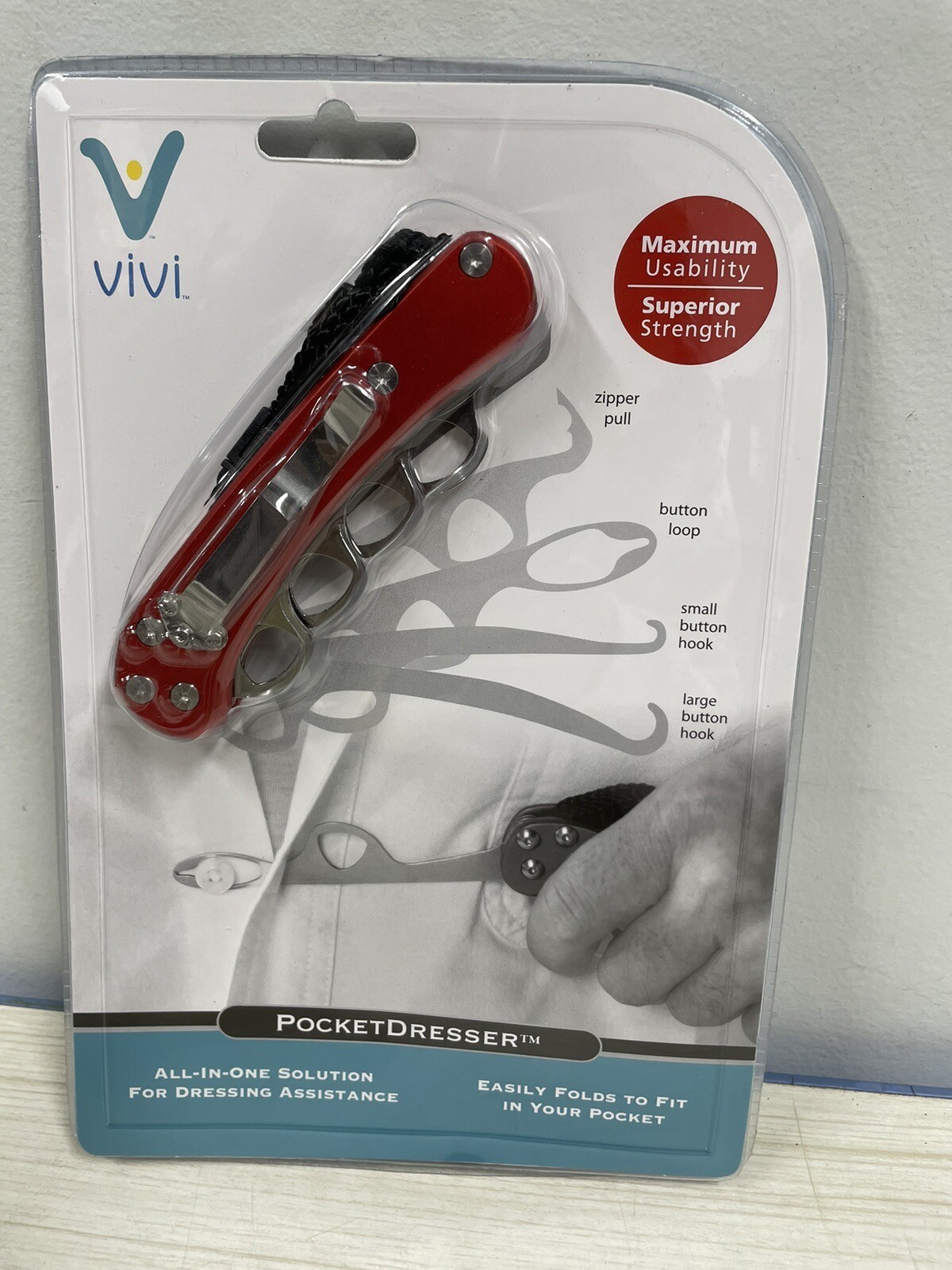 Zipper Pull and Button Hook Pocket Dresser and Dressing Aid for Assistance