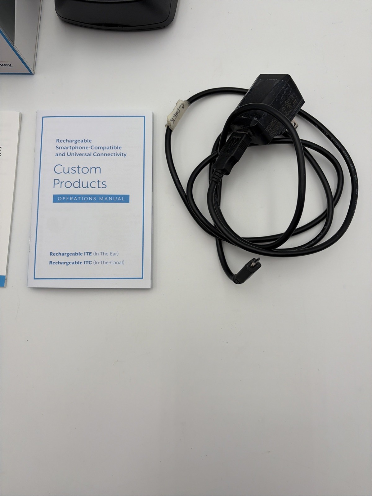 Used Starkey LIVIO AI 1200 RIC R Hearing Aids & Charging Case