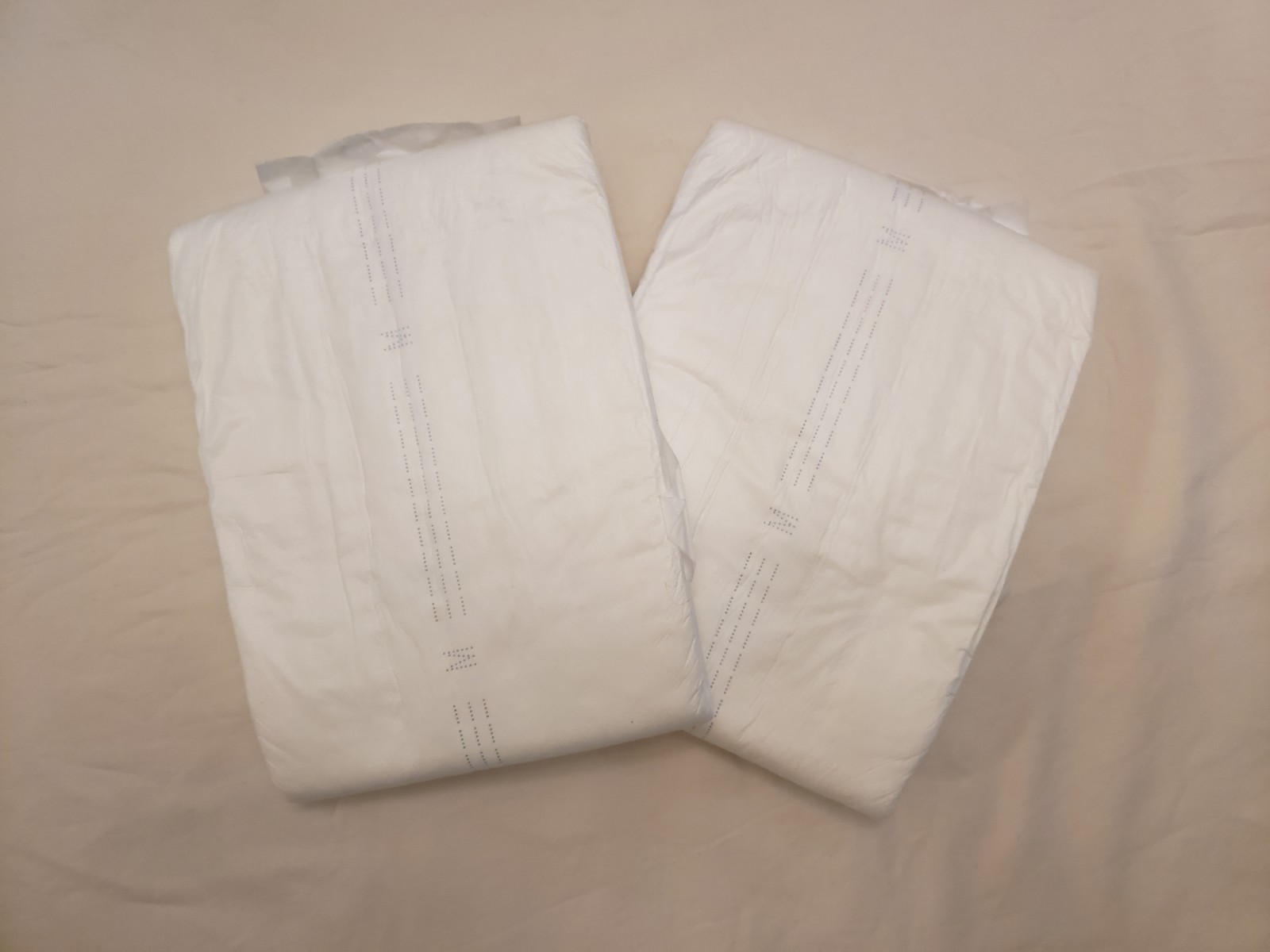 (2) Samples of Sunkiss Trust Plus Overnight Diapers Size Medium 2600ML 28″-34″