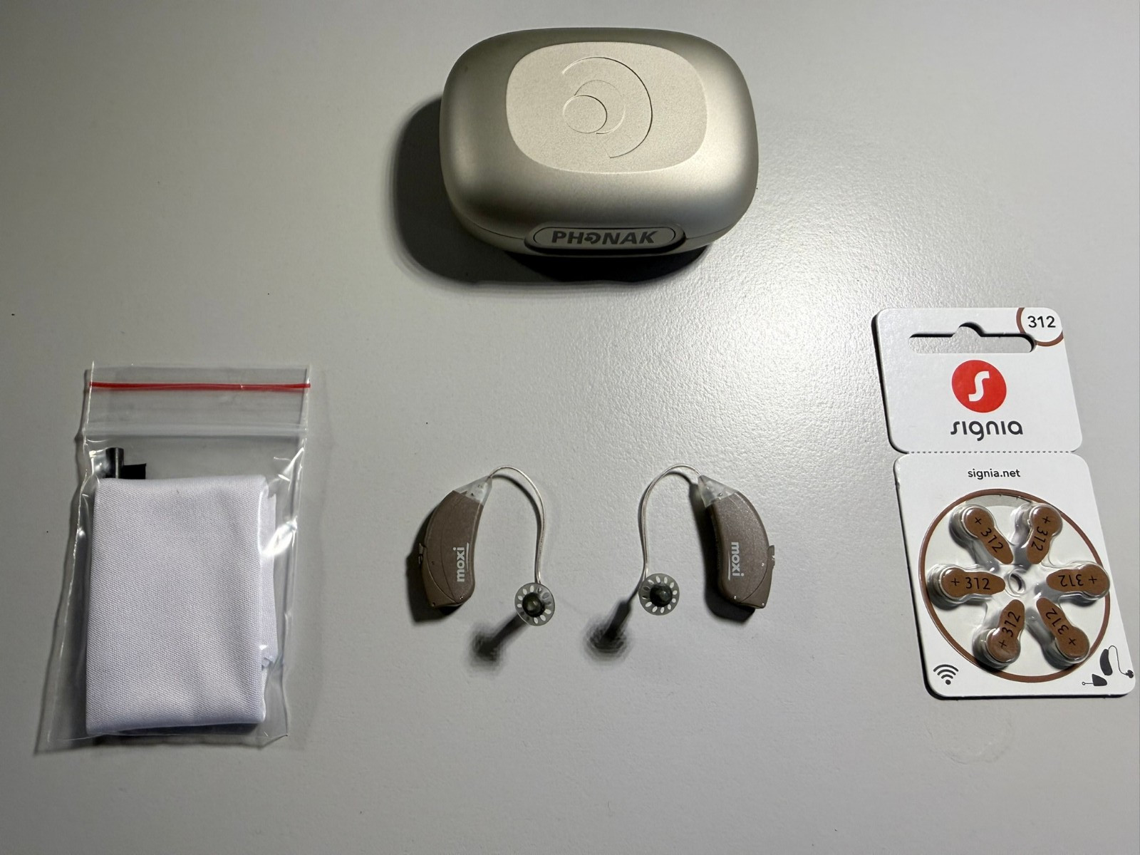 Unitron Moxi Next 16 Dir RIC hearing aids wireless premium model