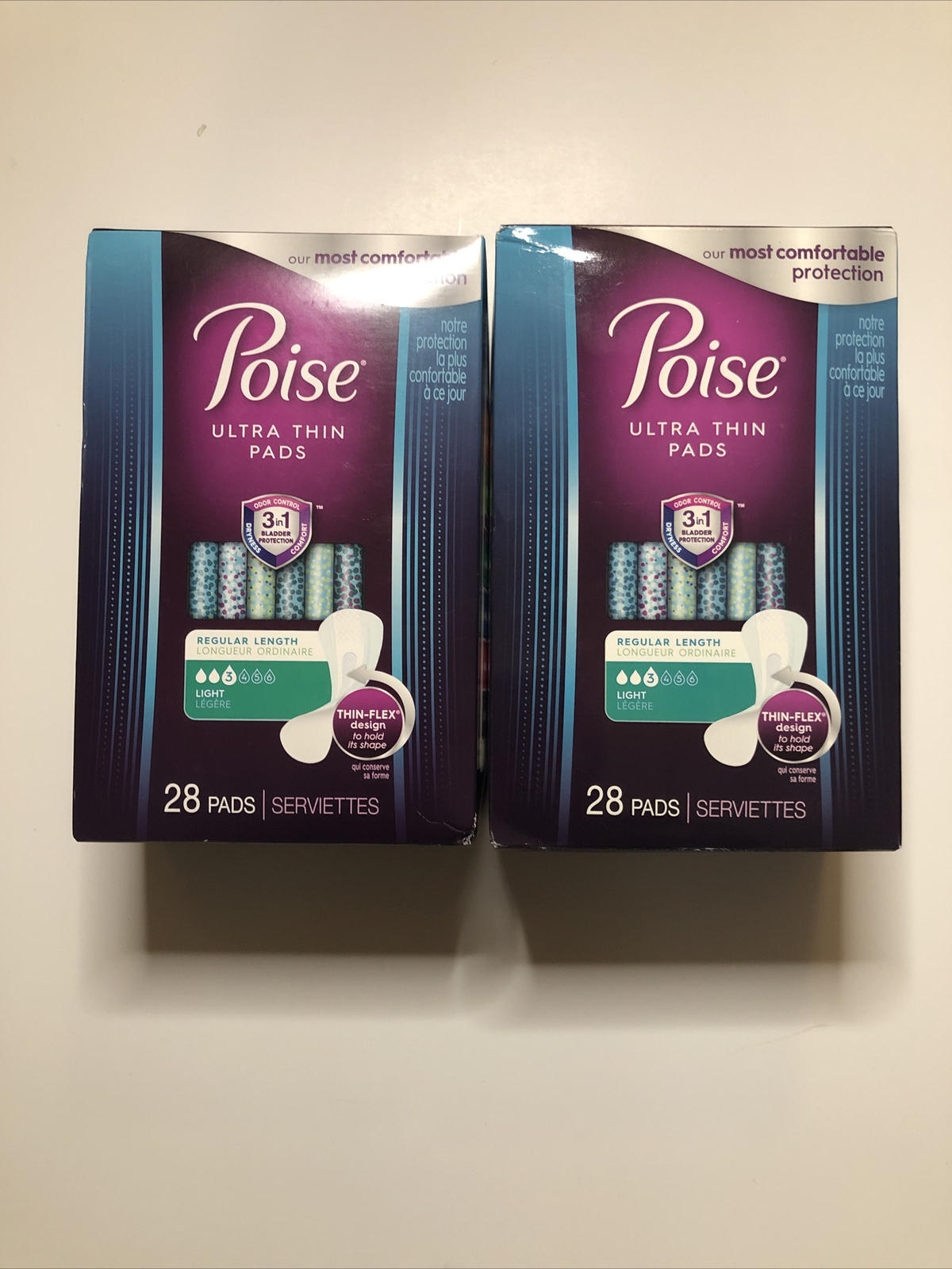 LOT OF 2 POISE ULTRA THIN PADS REGULAR LENGTH LIGHT 28 PADS PER PACK
