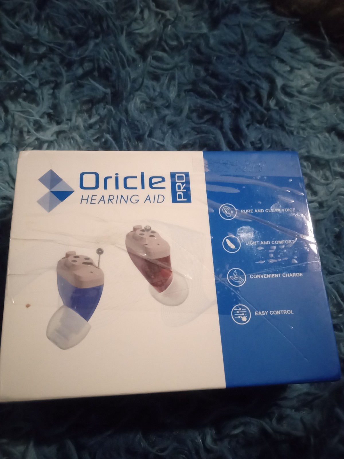 Oricle Pro hearing aids, rechargeable battery with charging case for both ears.