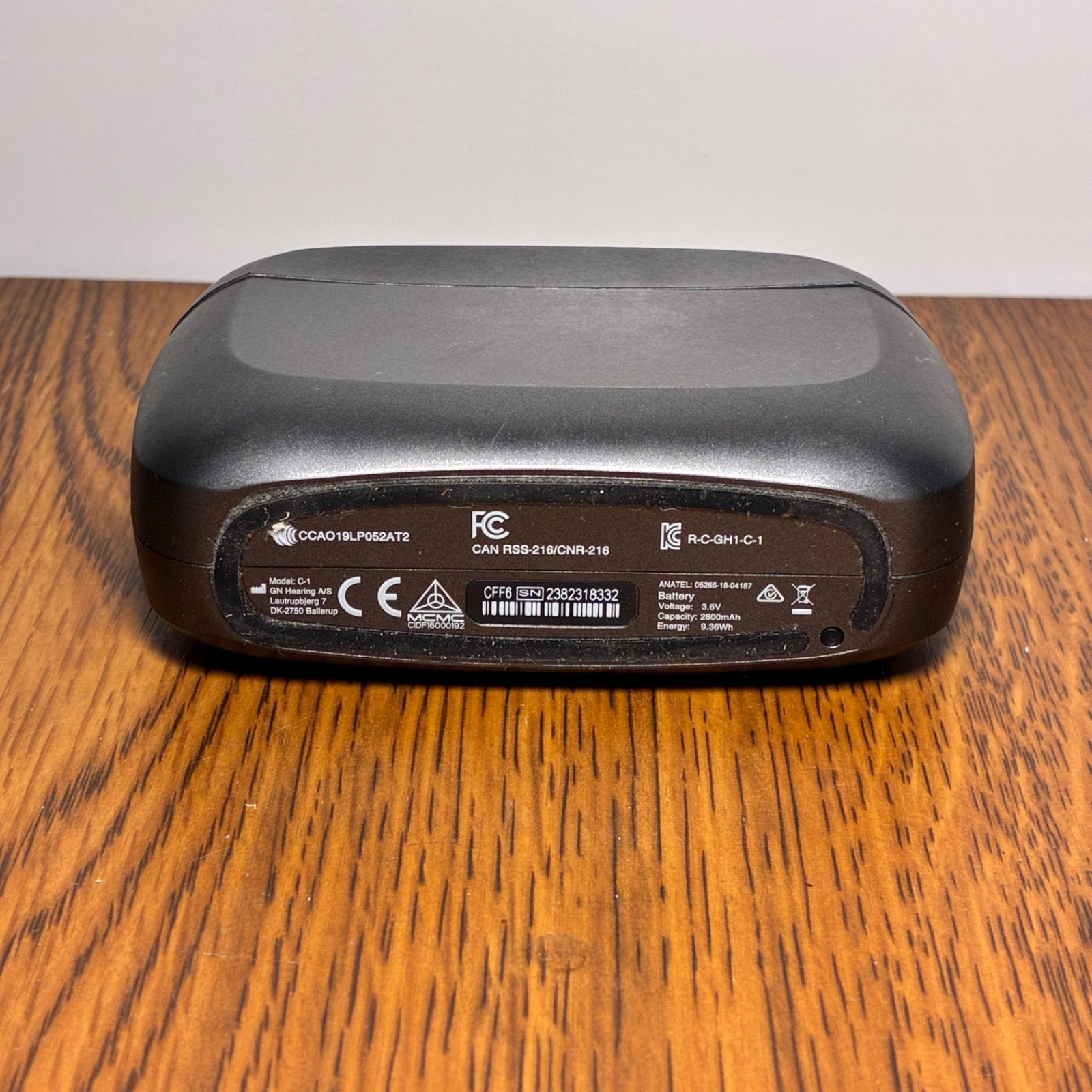 Left and Right Resound GN Hearing Aids and charging station w/cord.