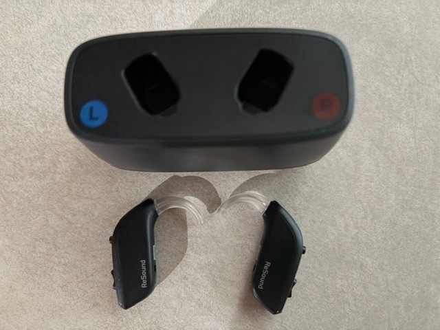 Gently used Resound hearing aids with c-3 charger