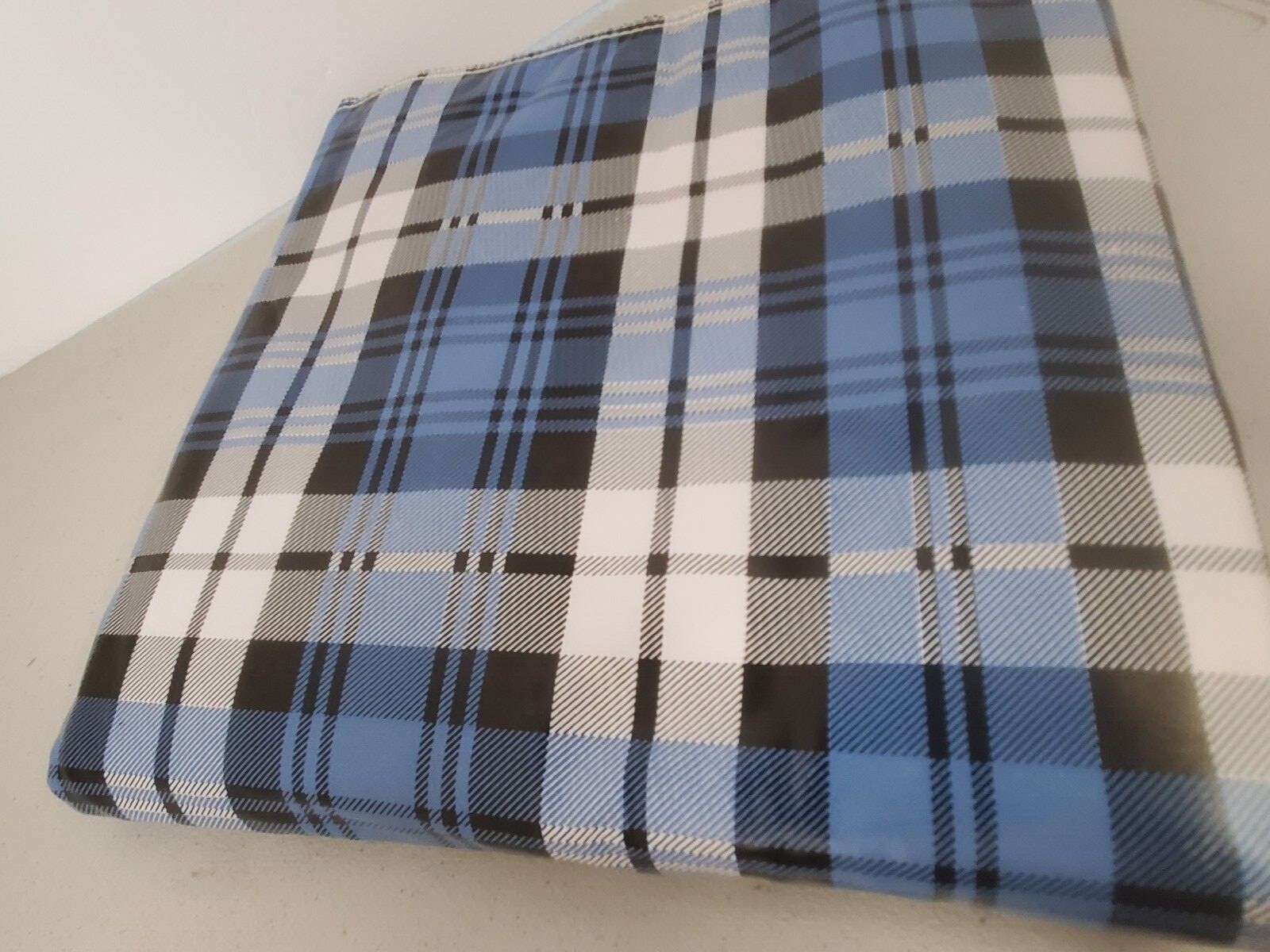 NEW Set of two (2) waterproof underpads. Blue and black plaid Approx. 32 x 34 in