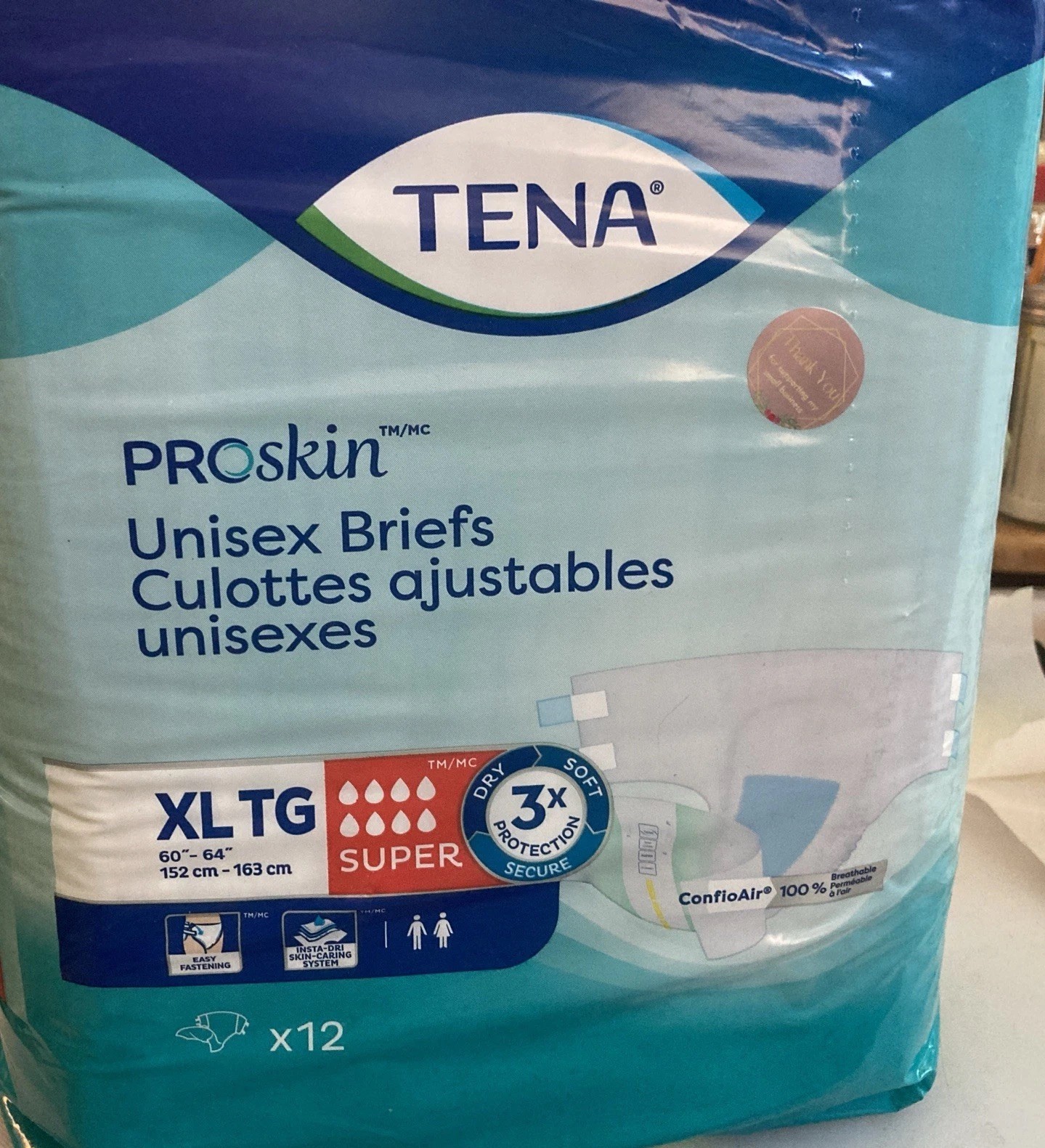 Tena ProSkin Unisex Diapers (Briefs), Super 3X Absorbency, 12 Count Size XL TG