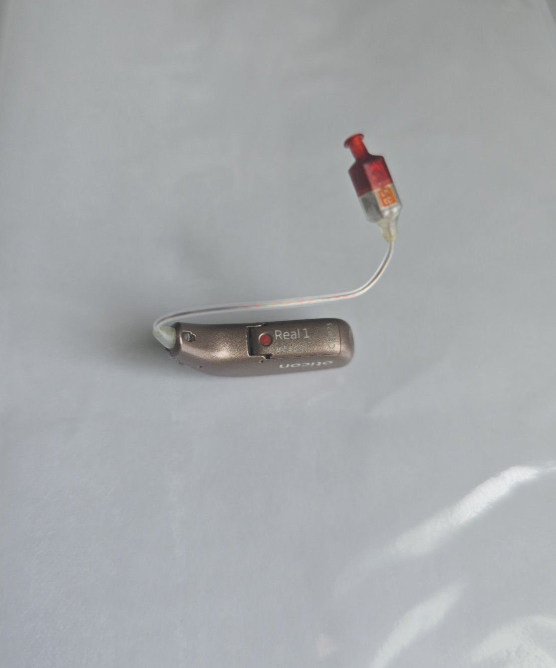1- Used Real 1 miniRiTE -R Hearing aid. Mild to sever hearing losses.