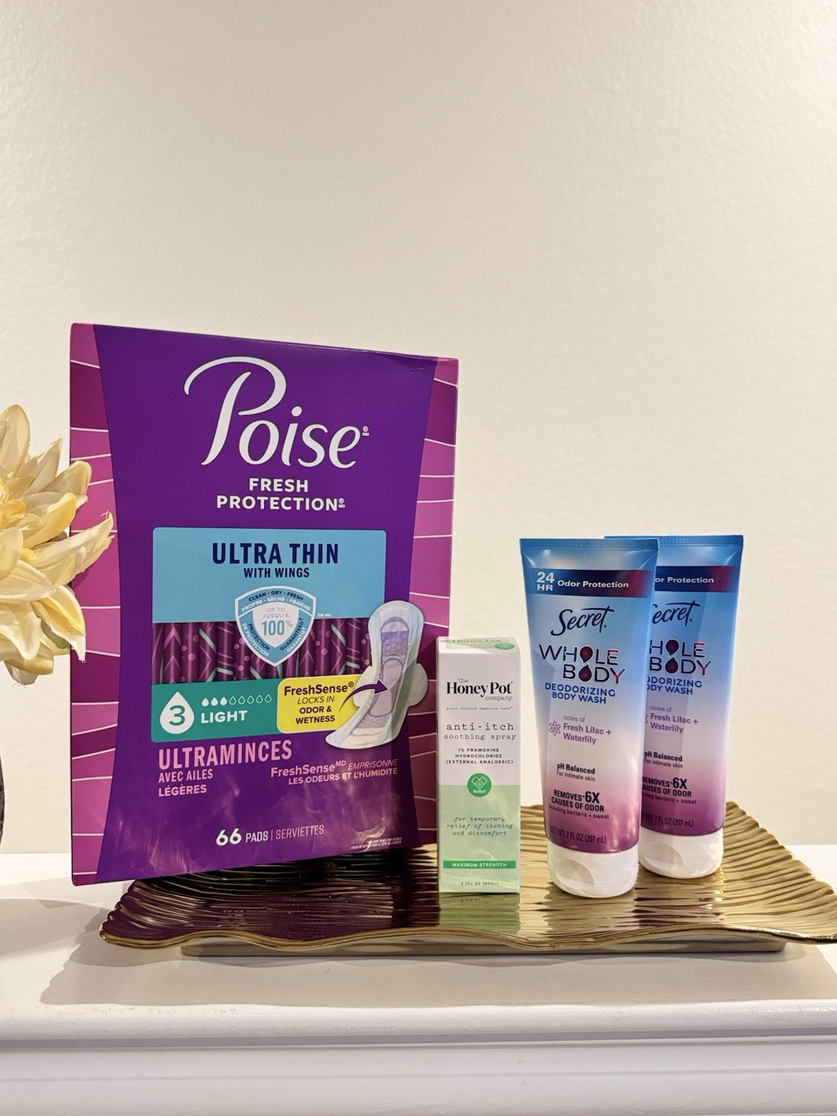 Poise Ultra Thin Pads (1) – The Honey Pot Anti-Itch (1) – Secret Whole Body (2)