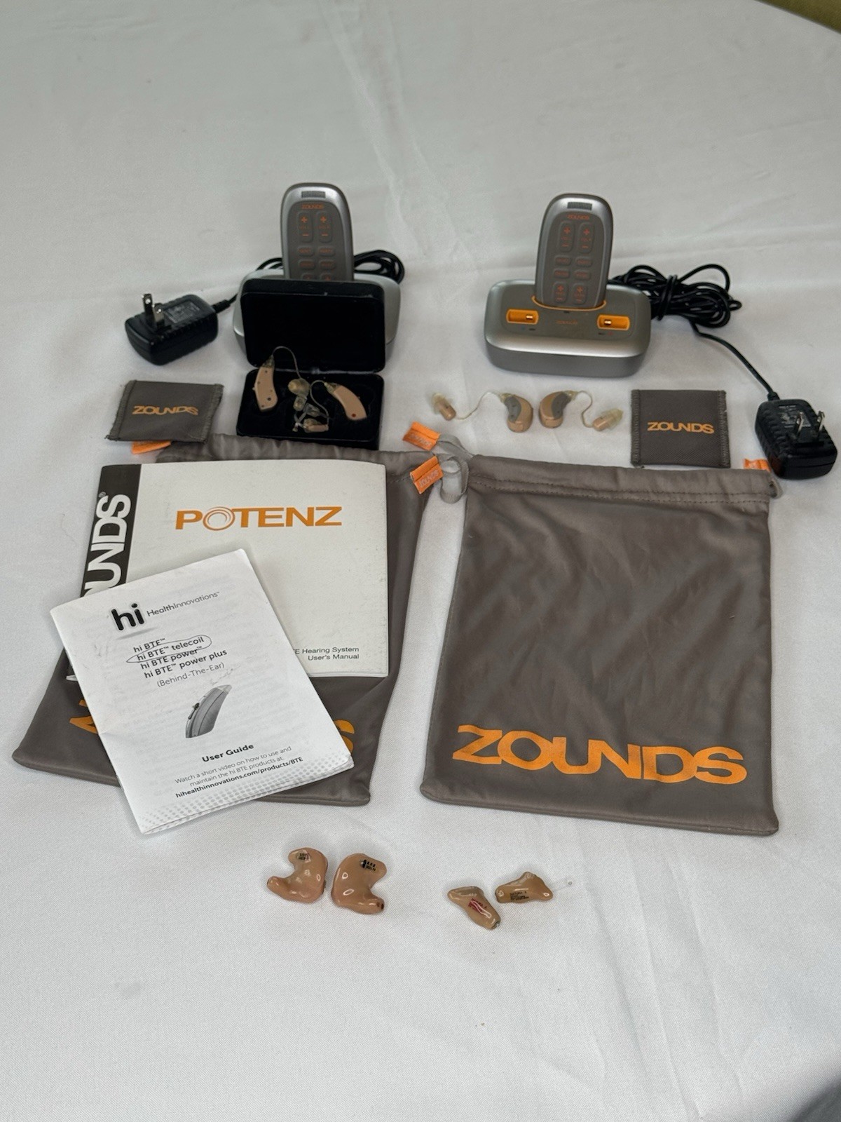 Hearing Aid Lot – 2 Pair BTE – 2 Pair ITE – Pouch, Case, Charging Bases, Remotes