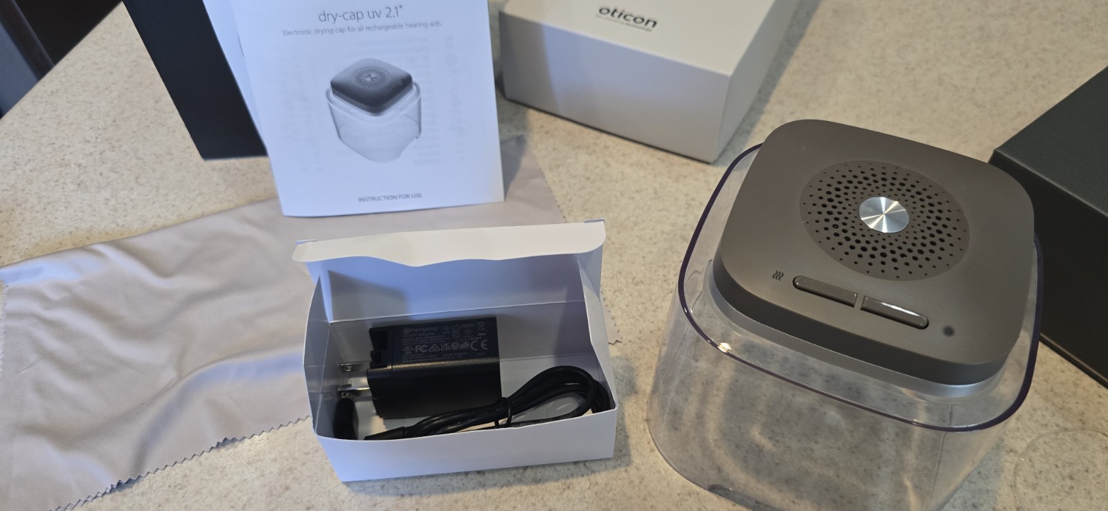 Oticon Real 2 MiniRite Hearing Aids with Charger + Flow Med Dry – Cap Uv 2.1
